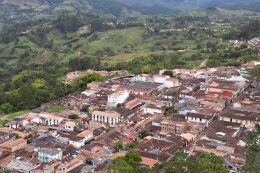 Houses located on the side of a mountain seen from the air. Jerico, Colombia.