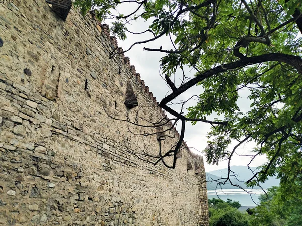 The rock wall of Ananuri preserves the ancient history