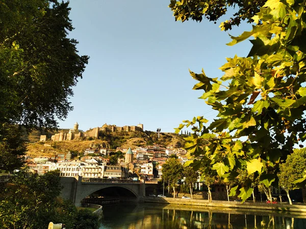 The view of Narikala from Mtkvari beach and the sunny morning of Tbilisi