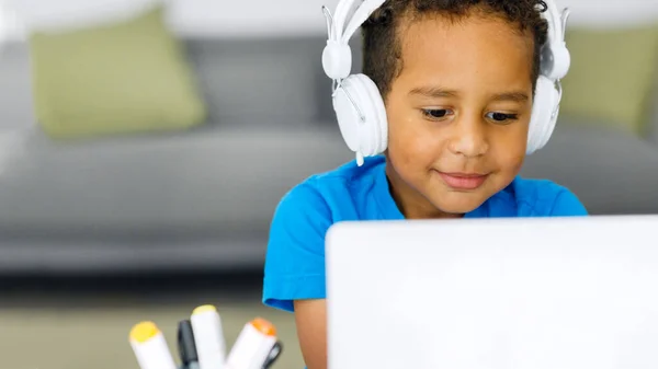 Black Student Child Doing Homework Using Computer Literature While Looking — Stock Photo, Image