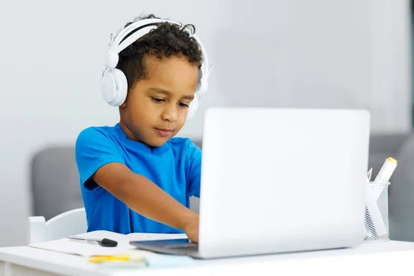 Portrait African American Boy Headphones Looking Laptop Background Home Interior — Stock Photo, Image