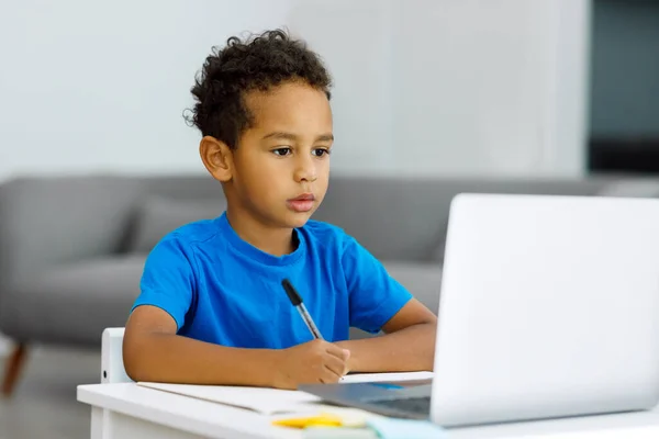 African American Boy Doing Homework Laptop Computer While Sitting Table — Photo