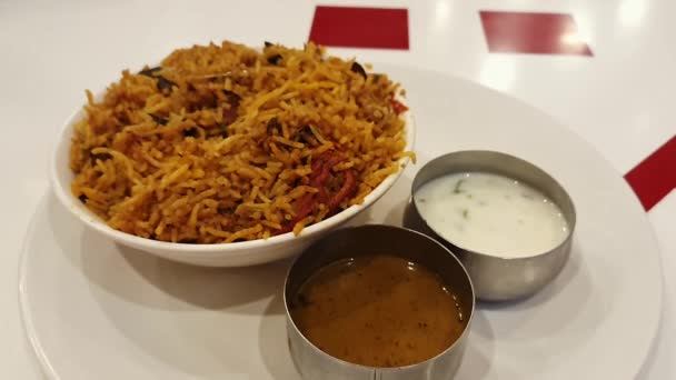 Unique Indian Food Chicken Biriyani Served Bowl Curd Curry Most — Vídeos de Stock