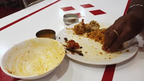 Man Finishes Eating Indian Popular Food Chicken Biriyani Served Curd — Vídeos de Stock