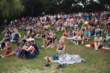Zhytomyr, Ukraine - July 6, 2021: Group of beautiful people at concert at summer festival.