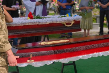 The funeral of a soldier of the Ukrainian army who died in the fight against Russian invaders. Military holding the coffin