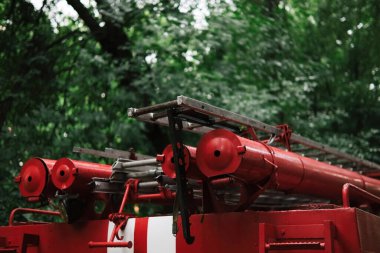Fire truck intervenes during a storm against a flood.