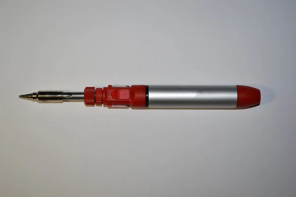 gas soldering iron on white background