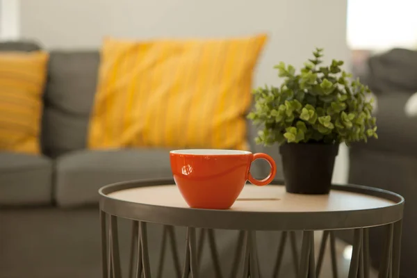 Orange Cup Table Couch Porcelain Mug Aromatic Coffee Background Gray Стоковая Картинка