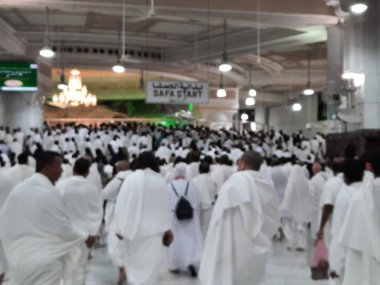 Pilgrims walk between the hills of Safa and Marwah during Umrah at the Masjid Al Haram in Mecca.