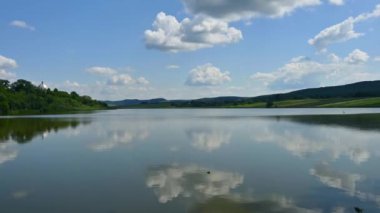 Clouds over the lake on a sunny day 