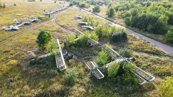 Top view of old training aircraft at an abandoned airfield in the city of Volchansk