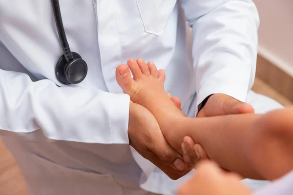 Doctor Examining Children Feet Hospital Surgeon Traumatologist Orthopedist Palpating Girl — Stock Photo, Image