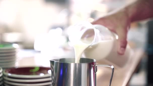 Barista Pouring Milk Pitcher — Stock Video