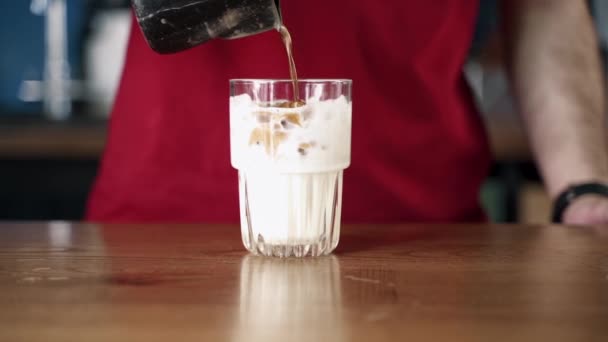 Barista Pours Coffee Glass Milk Ice — Stock Video