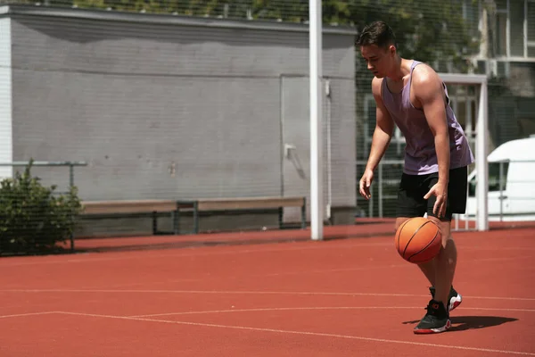 Young Guy Plays Basketball Basketball Court Throws Ball Ring Doing — Foto de Stock