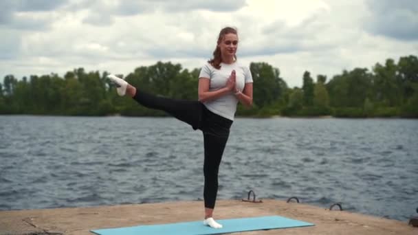 Sports Girl Doing Stretching River — Stock Video
