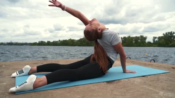 Sports Girl Doing Stretching River — Stock Video