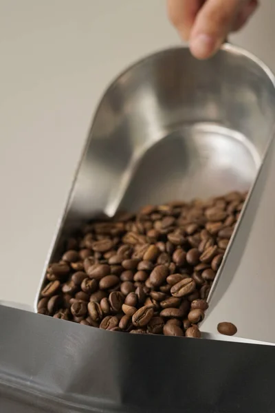 pour coffee into the package. close up