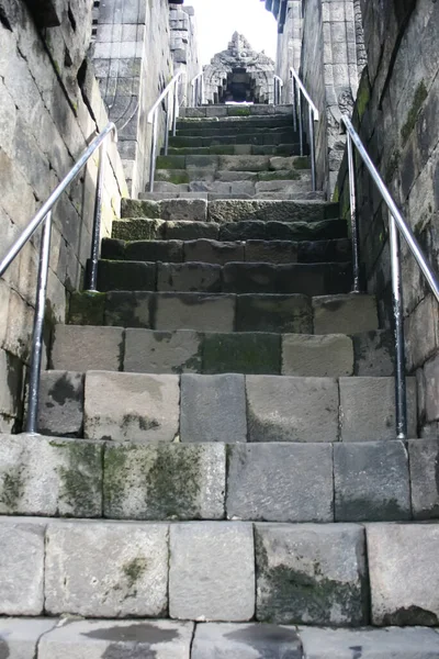 very high stone steps in one corner of Borobudur temple