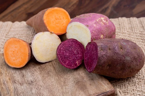 Colorful Root Vegetables Pink Purple Orange Organic Sweet Potatos Close — Stok Foto