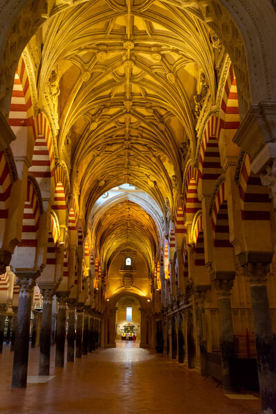 Medieval moorish architecture, colorful achways with columns in old mosque in Cordoba, Andalusia, Spain