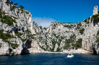View on Calanque d'En-vau with white sandy beach near Cassis, boat excursion to Calanques national park in Provence, France