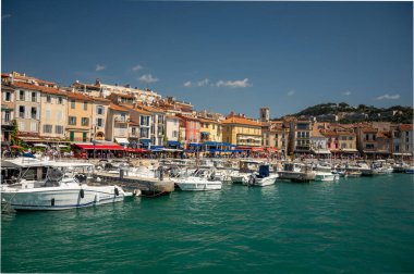 Sunny day in april in South of France, view on old fisherman's port with boats and colorful buildings in Cassis, Provence, France
