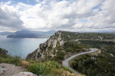 Touristic route D141 road from La Ciotat to Cassis, panoramic view on blue sea, limestone's cliffs and green pine forest, vacation in Provence, France