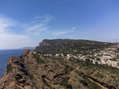 Aerial panoramic view on houses and sea near blue Calanque de Figuerolles in La Ciotat, Provence, summer vacation in France