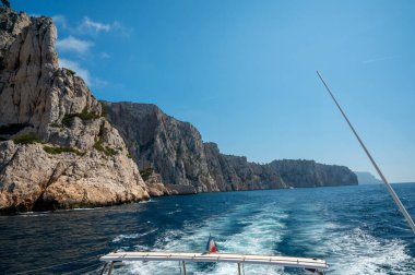 Limestone cliffs and blue sea near Cassis, boat excursion to Calanques national park in Provence, France