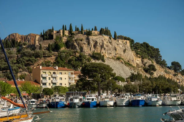 Sunny day in april in South of France, view on old fisherman's port with boats and colorful buildings in Cassis, Provence, France