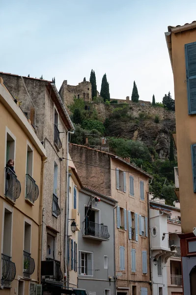 Rainy day in April in South of France, narrow streets and colorful buildings in Cassis, Provence, France