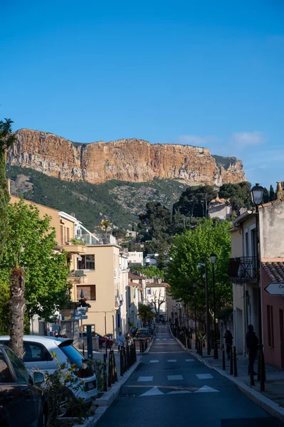 Sunny day in April in South of France, narrow streets and colorful buildings in Cassis, Provence, France