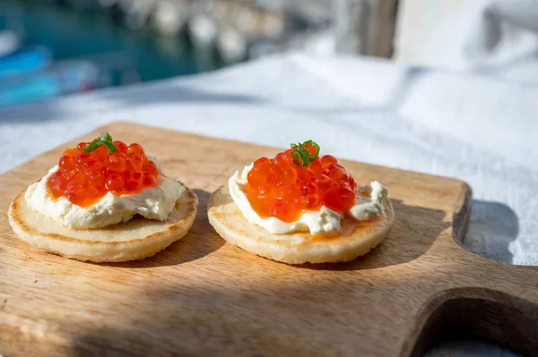 Two Small Starters Blinis Sour Cream Salted Salmon Red Caviar — Photo