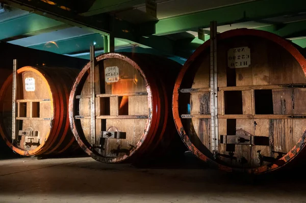 Old and modern equipment for distillation of strong alcoholic apple drink calvados in Normandy, Calvados region, France, tasting tour