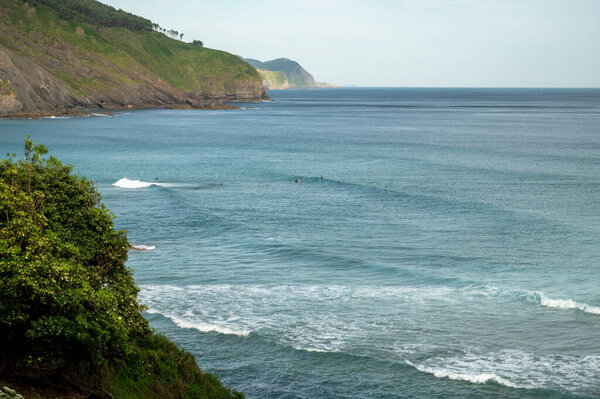 Atlantic ocean bay with sanly beach in Bakio, small touristic village near Bilbao, Basque Country, Spain