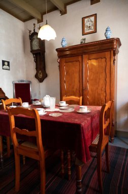 Old fashioned Dutch interior, tableware, orgel and room decoration in rich fisherman's house in North-Holland, Enkhuizen, Netherlands