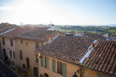 VIew on medieval buildings in sunny day, vacation destination, famous wine making village Chateauneuf-du-pape in Provence, France
