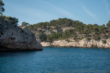 Tasting of red wine by old wine maker in Pierres Dores region with yellow stone houses on south of Beaujolais region France, wine appellation region