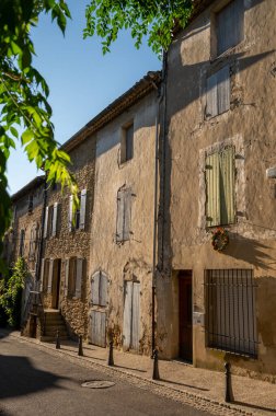 VIew on medieval buildings in sunny day, vacation destination, famous wine making village Chateauneuf-du-pape in Provence, France