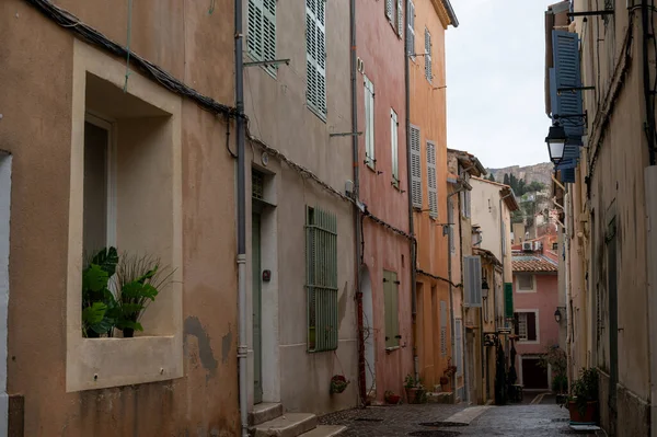 Rainy day in April in South of France, narrow streets and colorful buildings in Cassis, Provence, France