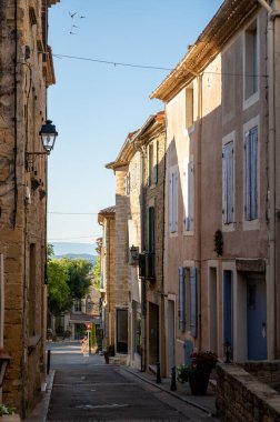 VIew on medieval buildings in sunny day, vacation destination, famous wine making village Chateauneuf-du-pape in Provence, France