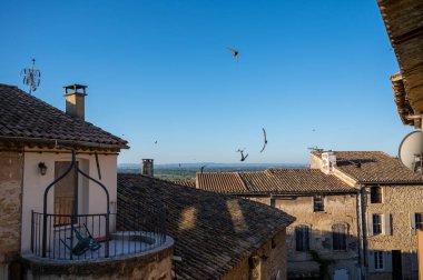 VIew on medieval buildings in sunny day, vacation destination, famous wine making village Chateauneuf-du-pape in Provence, France