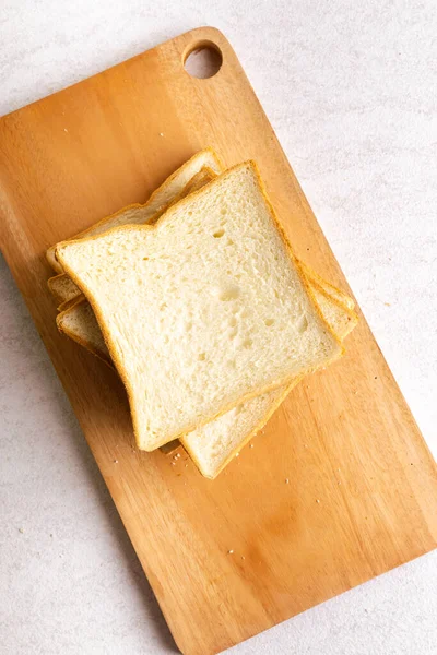Pile Toasted Bread Slices Cutting Board Breakfast Isolated Bright Background — 图库照片