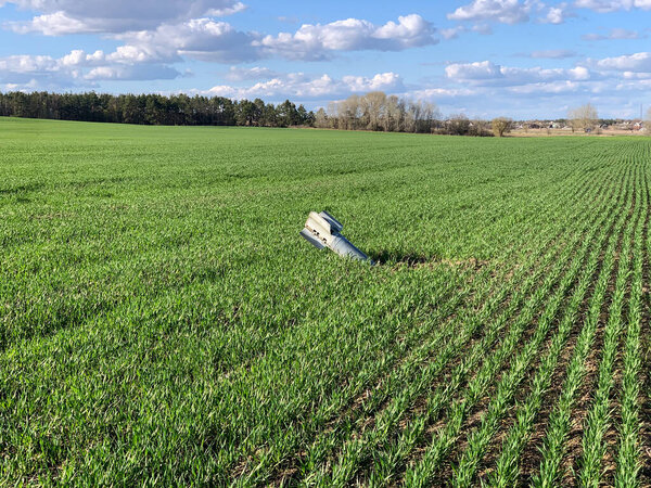 Chernihiv, Ukraine - 27.04.2022: Russian rocket fell on the field in Chernihiv and did not explode