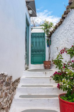 Ancient white street in Plaka district, Athens, Greece
