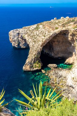 The Blue Grotto of Malta, rock formation on the sea with crystal clear water