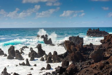 Powerful waves against the sea stacks of Lanzarote island, Atlantic Ocean, Canary Islands, Spain