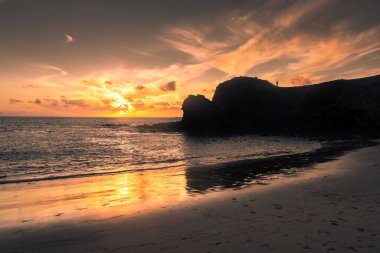 Beautiful sunset over the Atlantic Ocean at Papagayo Beach, Lanzarote, Canary Islands, Spain